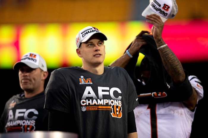 Cincinnati Bengals quarterback Joe Burrow (9) looks on during the AFC Championship trophy celebration after the AFC championship NFL football game, Sunday, Jan. 30, 2022, at GEHA Field at Arrowhead Stadium in Kansas City, Mo. Cincinnati Bengals defeated Kansas City Chiefs 27-24. Cincinnati Bengals At Kansas City Chiefs Jan 30 Afc Championship 106